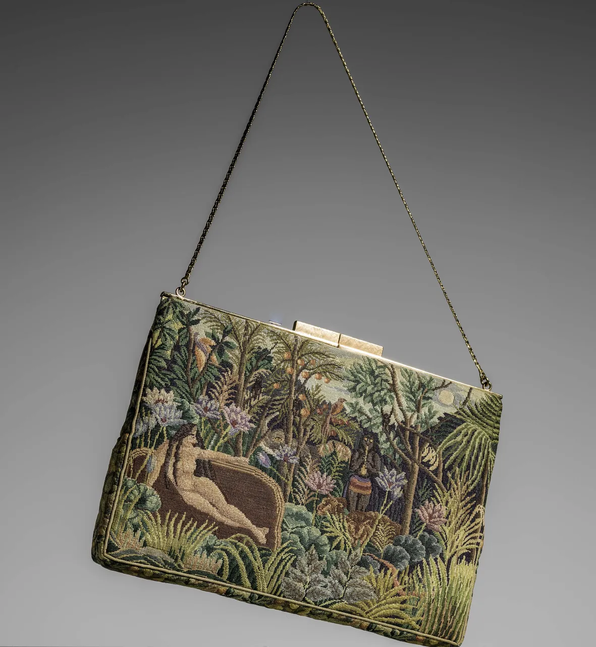 Petit-point handbag reproducing Henri Rousseau’s The Dream, studio photograph.